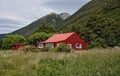 Red Cottage in the Mountains. Royalty Free Stock Photo